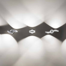 Load image into Gallery viewer, Nautilus LED Wall Light in Detail.
