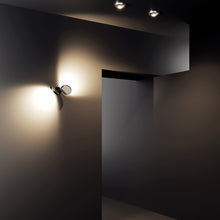 Load image into Gallery viewer, Nautilus LED Wall Light in living room.
