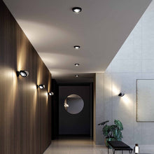 Load image into Gallery viewer, Nautilus LED Wall Light in living room.
