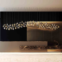 Load image into Gallery viewer, Nostalgia Medium LED Pendant Light in living room.
