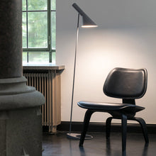Load image into Gallery viewer, AJ Floor Lamp in living room.
