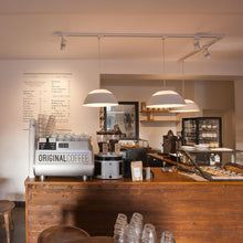 Load image into Gallery viewer, AJ Royal LED Pendant Light in coffee shop.
