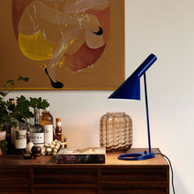 Load image into Gallery viewer, AJ Table Lamp in living room.

