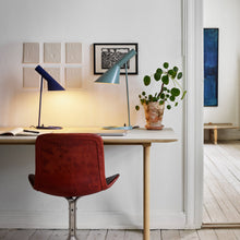 Load image into Gallery viewer, AJ Table Lamp in living room.
