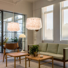 Load image into Gallery viewer, Collage Pendant Light in living room.
