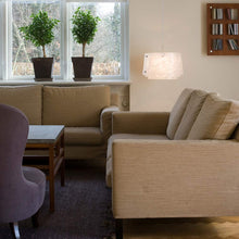 Load image into Gallery viewer, Collage Pendant Light in living room.

