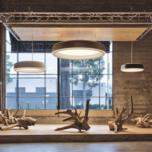 Load image into Gallery viewer, LP Grand LED Pendant Light in living room.
