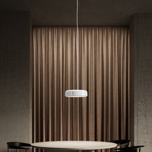 Load image into Gallery viewer, LP Grand LED Pendant Light in living room.

