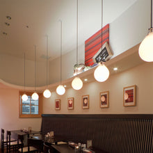 Load image into Gallery viewer, Moser Ø Pendant Light in restaurant.
