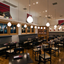 Load image into Gallery viewer, Moser Ø Pendant Light in restaurant.
