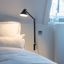 Load image into Gallery viewer, NJP Adjustable LED Wall Light in bedroom.
