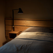 Load image into Gallery viewer, NJP Adjustable LED Wall Light in bedroom.
