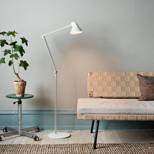 Load image into Gallery viewer, NJP LED Floor Lamp in living room.
