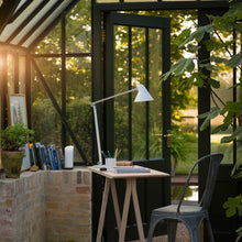 Load image into Gallery viewer, NJP LED Table Lamp in Outside Area.
