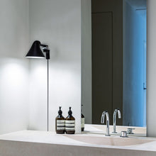 Load image into Gallery viewer, NJP LED Wall Light in bathroom.
