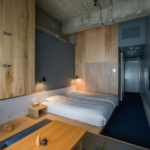 Load image into Gallery viewer, NJP LED Wall Light in bedroom.
