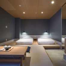 Load image into Gallery viewer, NJP LED Wall Light in bedroom.

