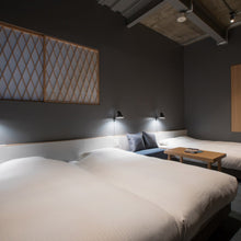 Load image into Gallery viewer, NJP LED Wall Light in bedroom.

