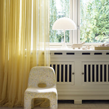 Load image into Gallery viewer, Panthella 320 Table Lamp in living room.
