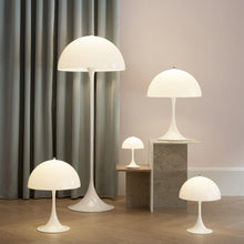 Load image into Gallery viewer, Panthella 320 Table Lamp in living room.
