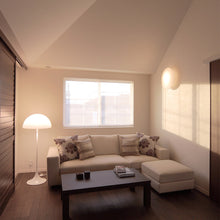 Load image into Gallery viewer, Panthella Floor Lamp in living room.

