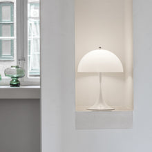 Load image into Gallery viewer, Panthella LED Mini Table Lamp in living room.
