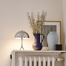Load image into Gallery viewer, Panthella LED Mini Table Lamp in living room.
