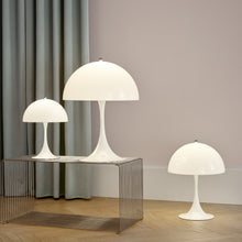 Load image into Gallery viewer, Panthella Table Lamp in living room.
