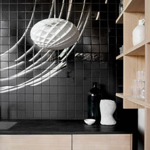 Load image into Gallery viewer, Patera Oval Pendant Light in dining room.
