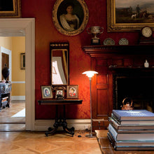 Load image into Gallery viewer, PH 3½-2½ Floor Lamp in living room.

