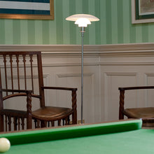Load image into Gallery viewer, PH 3½-2½ Floor Lamp in living room.
