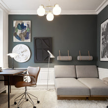 Load image into Gallery viewer, PH 3½-2½ Glass Table Lamp in office.
