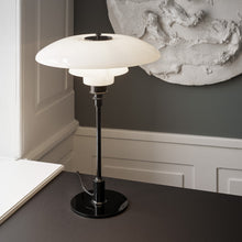 Load image into Gallery viewer, PH 3½-2½ Glass Table Lamp in living room.
