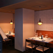 Load image into Gallery viewer, PH 3½-3 Pendant Light in restaurant.
