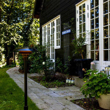 Load image into Gallery viewer, PH 3-2½ Outdoor Bollard in Outside Area.
