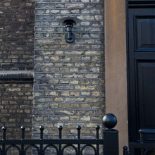 Load image into Gallery viewer, PH 3-2½ Wall Light in Outside Area.
