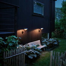 Load image into Gallery viewer, PH 3-2½ Wall Light in Outside Area.
