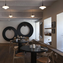 Load image into Gallery viewer, PH 3/2 Pendant Light in restaurant.
