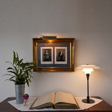 Load image into Gallery viewer, PH 3/2 Table Lamp in living room.
