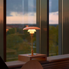 Load image into Gallery viewer, PH 3/2 Table Lamp in living room.
