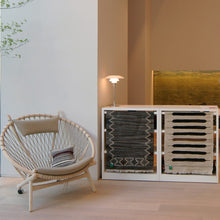 Load image into Gallery viewer, PH 3/2 Table Lamp in living room.
