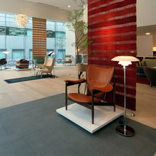 Load image into Gallery viewer, PH 4½-3½ Floor Lamp in lobby.

