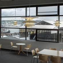 Load image into Gallery viewer, PH 5-4½ Pendant Light in restaurant.
