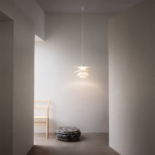 Load image into Gallery viewer, PH 5-4½ Pendant Light in living room.
