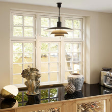 Load image into Gallery viewer, PH 5/5 Pendant Light in living room.
