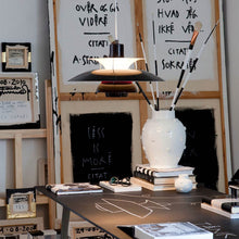 Load image into Gallery viewer, PH 5 Pendant Light in living room.
