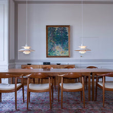 Load image into Gallery viewer, PH 5 Pendant Light in living room.
