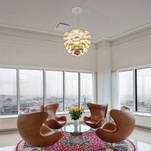 Load image into Gallery viewer, PH Artichoke Pendant Light in living room.

