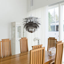 Load image into Gallery viewer, PH Artichoke Pendant Light in dining room.
