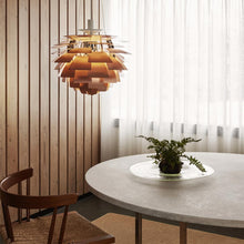 Load image into Gallery viewer, PH Artichoke Pendant Light in dining room.
